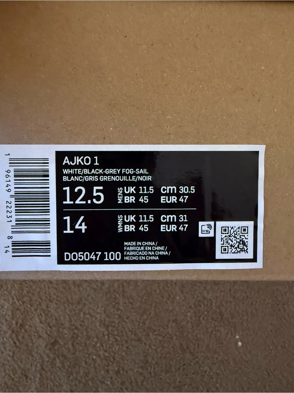 Jordan• 1 Retro AJKO in White, Black, Grey Fog Sail